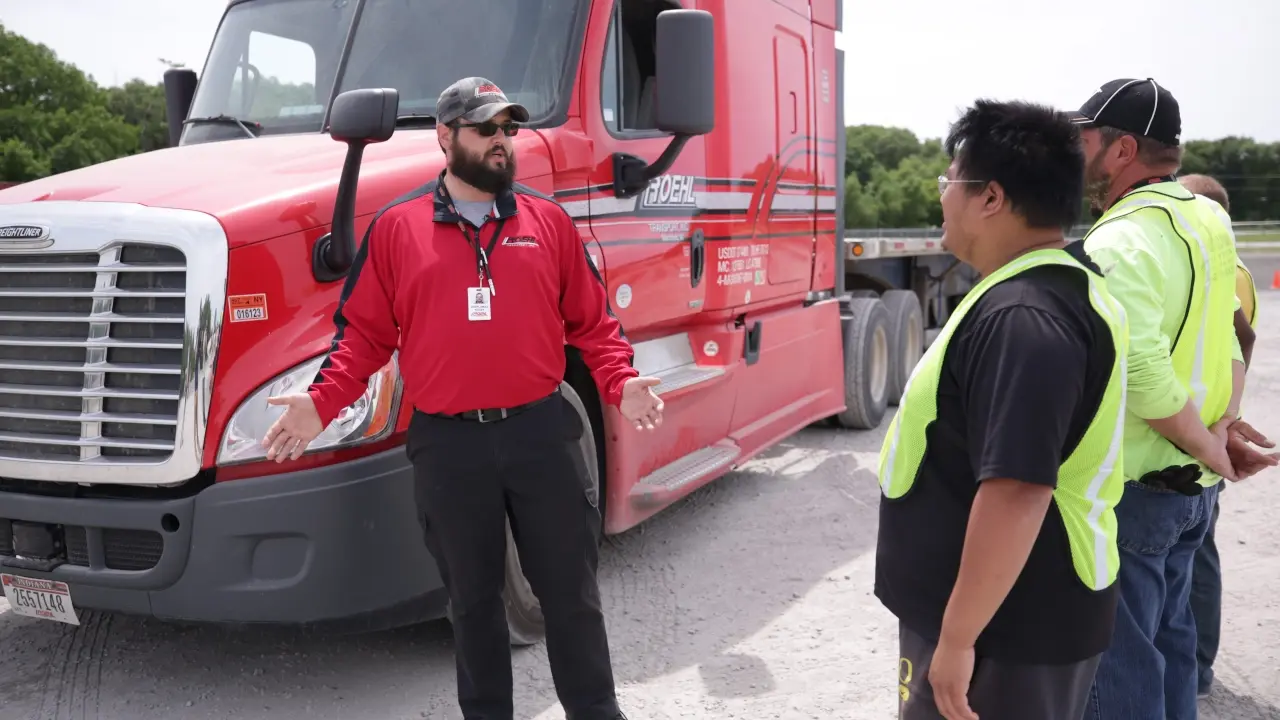 Driving Instructor Talking to CDL Trainees