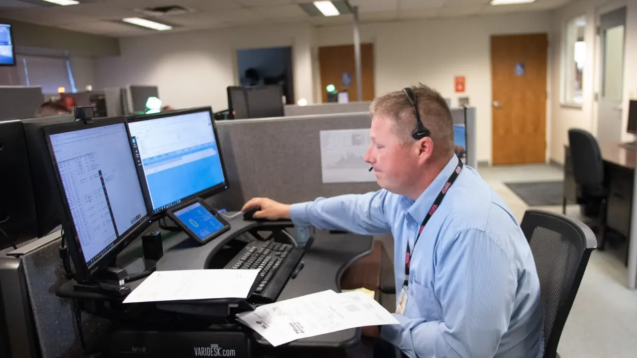 Roehl non-driving teammate at his desk