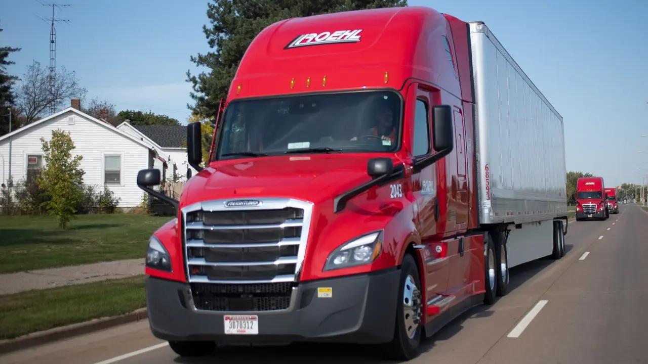 Roehl Semi Trucks Driving on Road