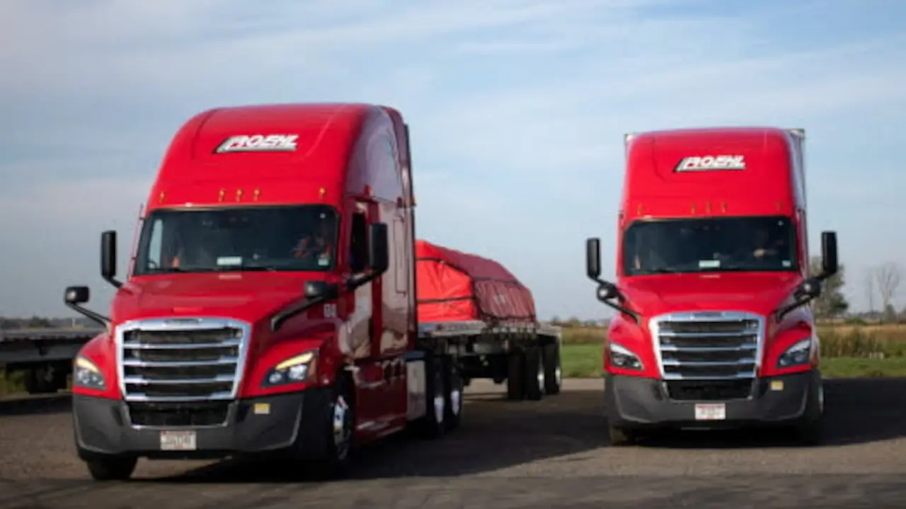 Two Roehl trucks in parking lot