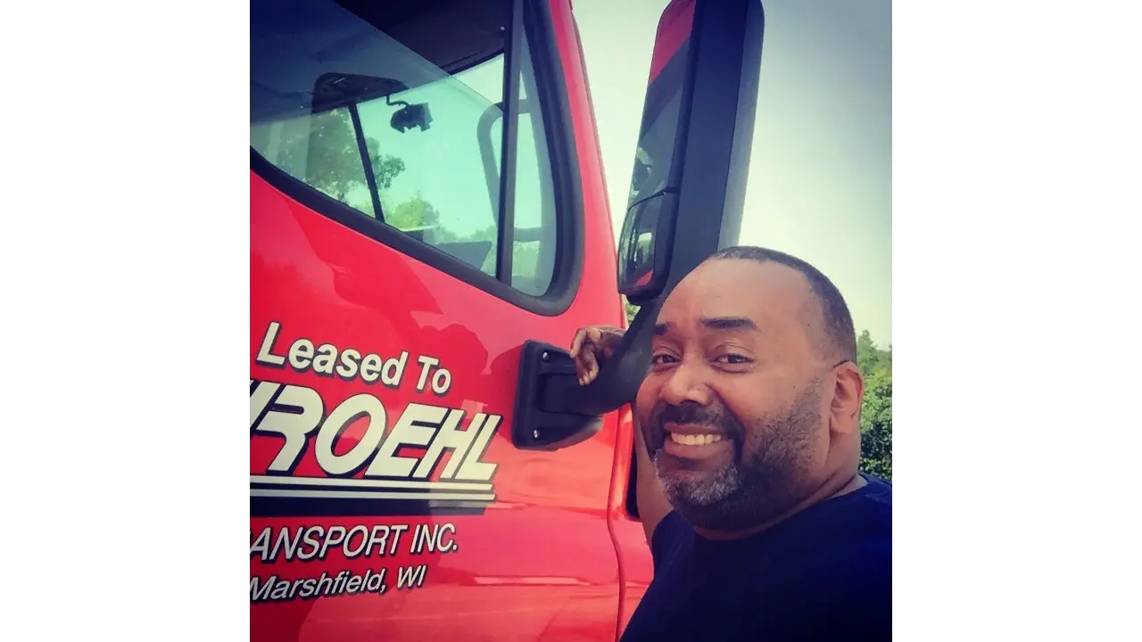 Rodney A near his leased truck