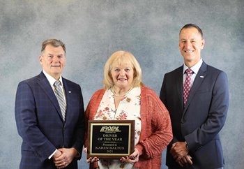 Karen Baltus with CEO Rick Roehl & Van President Don Ingersoll