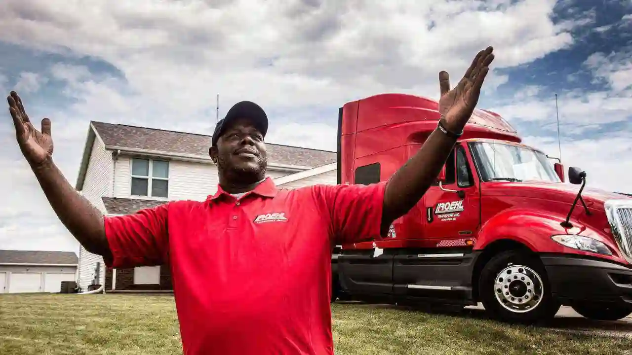 Driver outside his home