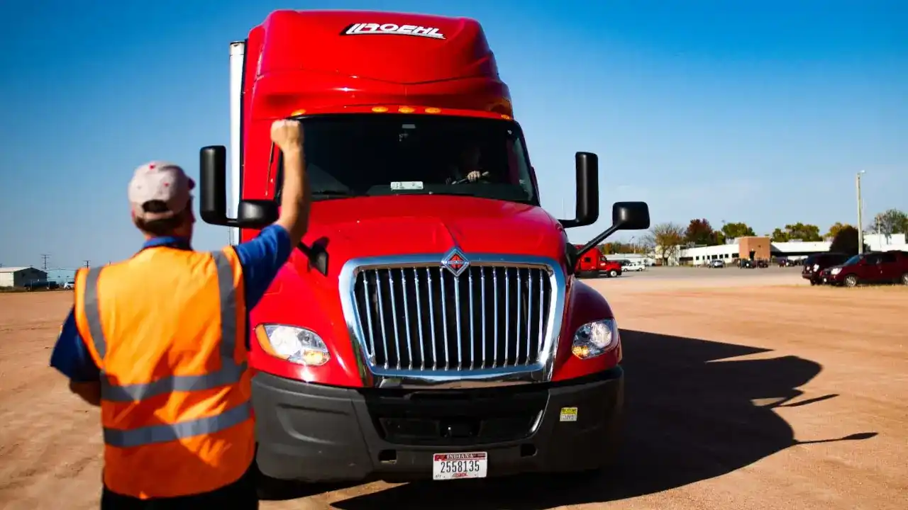 Driver Instructor giving directions to student