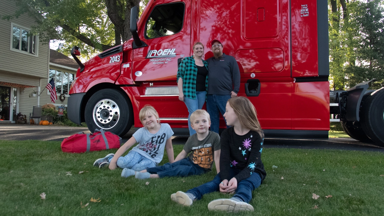 Smith family in front of Roehl truck