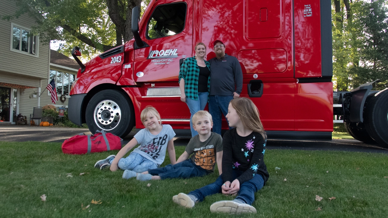 Smith family in front of truck