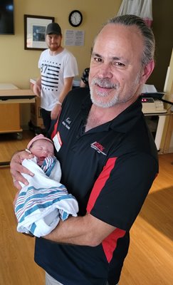 Truck driver Kent D with his first grandchild