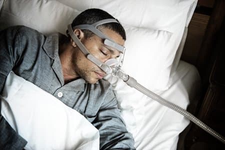 Person will sleep apnea machine